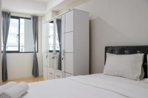 Comfort 2BR at Daan Mogot City Apartment By Travelio