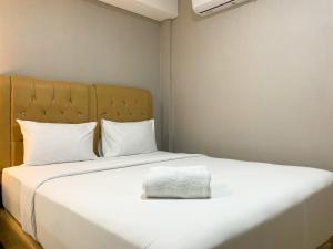 Nice and Strategic 2BR at 16th Floor Daan Mogot City Apartment By Travelio