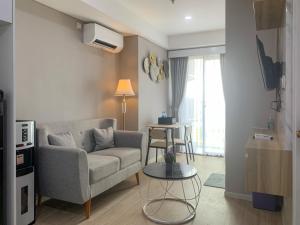 Nice and Strategic 2BR at 16th Floor Daan Mogot City Apartment By Travelio