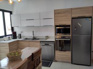 98m2 neuf en RDC, 3 ch, tout confort