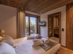 Chalets Chalet de Luxe avec Piscine et Sauna, Proche des Pistes a Courchevel - FR-1-568-33 : photos des chambres