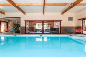 Appartements Piscine interieure, SPA et Jeux open for 15 guests : photos des chambres