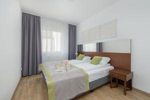 Atrium Apartment Spa & Gym 150m to the Beach Sarbinowo by Noclegi Renters