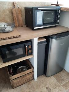 Appartements Studio au calme tout equipe : photos des chambres