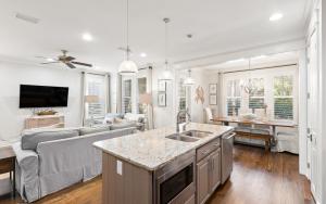 Two Rocking Chairs on a Porch by Oversee 30A