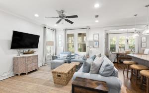 Two Rocking Chairs on a Porch by Oversee 30A