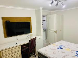 Ap Jardins c garagem CD 81