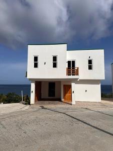 Vista al mar alojamiento familiar Villa Palmetto