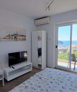 Studio with Sea & City Views