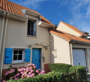 Maisons de vacances La Maison La Brise Bleue, Jardin, Garage, 400m Plage : photos des chambres