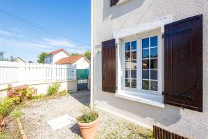 Maisons de vacances La Maison Cabourgeaise proche mer : photos des chambres