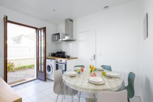 Maisons de vacances La Maison Cabourgeaise proche mer : photos des chambres