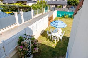Maisons de vacances La Maison Cabourgeaise proche mer : photos des chambres