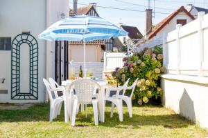 Maisons de vacances La Maison Cabourgeaise proche mer : photos des chambres