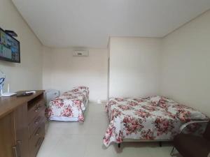 Suíte para 5 Pessoas com Ar e Próxima ao Centro