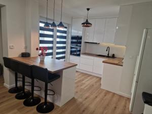 Apartament w Centrum z wanną z hydromasażem