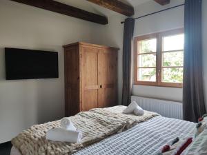 Maisons d'hotes Geraniums Et Neige Fraiche, Maison d'Hotes avec balneo massante et sauna privatifs dans certaines suites haut standing : photos des chambres