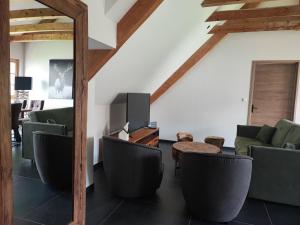 Maisons d'hotes Geraniums Et Neige Fraiche, Maison d'Hotes avec balneo massante et sauna privatifs dans certaines suites haut standing : photos des chambres