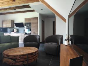 Maisons d'hotes Geraniums Et Neige Fraiche, Maison d'Hotes avec balneo massante et sauna privatifs dans certaines suites haut standing : photos des chambres