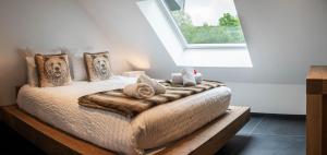 Maisons d'hotes Geraniums Et Neige Fraiche, Maison d'Hotes avec balneo massante et sauna privatifs dans certaines suites haut standing : photos des chambres