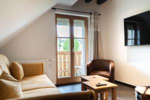 Maisons d'hotes Geraniums Et Neige Fraiche, Maison d'Hotes avec balneo massante et sauna privatifs dans certaines suites haut standing : photos des chambres