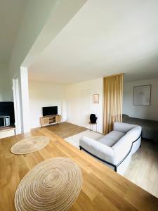 Appartements Appart equipe en plein coeur de Lisle Adam : photos des chambres