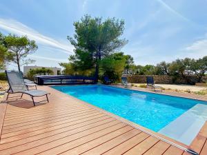 Villas Villa moderne piscine privative hauteurs de Nimes : photos des chambres