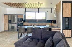 Villas Villa moderne piscine privative hauteurs de Nimes : photos des chambres