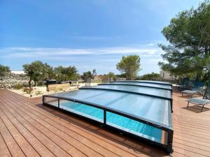 Villas Villa moderne piscine privative hauteurs de Nimes : photos des chambres