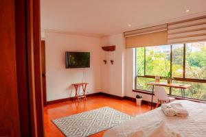 Habitación de Comfort total en el Poblado - A2