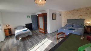 Maisons d'hotes Le Clos des Quatre Lieues : photos des chambres