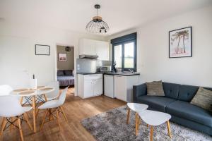 Appartements T2 clinique croix du sud climatise parking lit bultex : photos des chambres