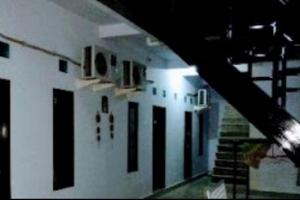 Hotel O Ezhar Boka Homestay Near GOR Sulis Bulutangkis