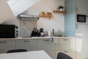 Appartements Suite Sous Velux T2 : photos des chambres