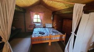 Waldferienhaus 98 im bayerischen Waldferiendorf I 3 Schlafzimmer I Lagerfeuerplatz