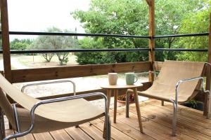 Appartements Le Petit Saint Trophime : photos des chambres