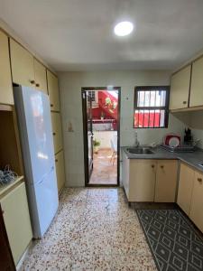 La casa amarilla de Luis y Eileen