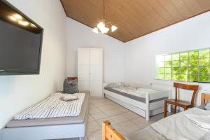 Arbeitnehmerunterkunft I 3 Betten I Balkon I eigene Küche & Bad