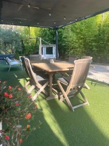 Villas Superbe maison avec jacuzzi : photos des chambres