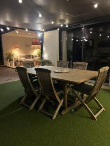 Villas Superbe maison avec jacuzzi : photos des chambres