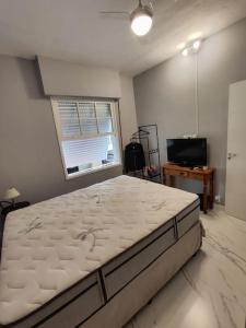 Apartamento em Santos na Beira mar com Vaga privativa e Wifi