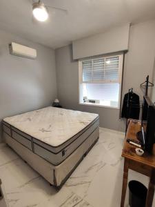 Apartamento em Santos na Beira mar com Vaga privativa e Wifi