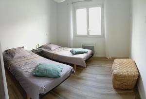 Maisons de vacances Maison Emeraude a Gan 64290 : photos des chambres