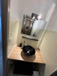 Appartements Studio chaleureux et lumineux : photos des chambres