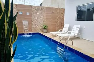 Casa com Piscina, Churrasqueira e Ótima localização - Roteiro