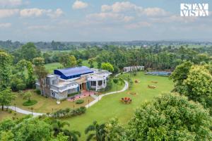 StayVista at Wandering Vines Indoor Pool 4BHK Luxury Villa in Delhi Sohna