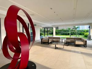 High Rise Condo with Balcony, Pool, Grand Lobby, and Sky Garden 22F