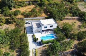 Modern Villa Elia with 40sqm heated pool, 3 bedrooms, and Split city views