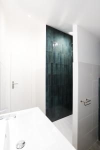 Appartements Maison au calme, proche gare & centre-ville : photos des chambres