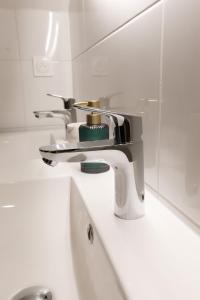 Appartements Maison au calme, proche gare & centre-ville : photos des chambres